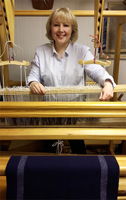 Anneli Berntsson (1996) weaving the Magdalene Shawl